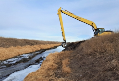 North Dry Creek Drainage District dredging excavator