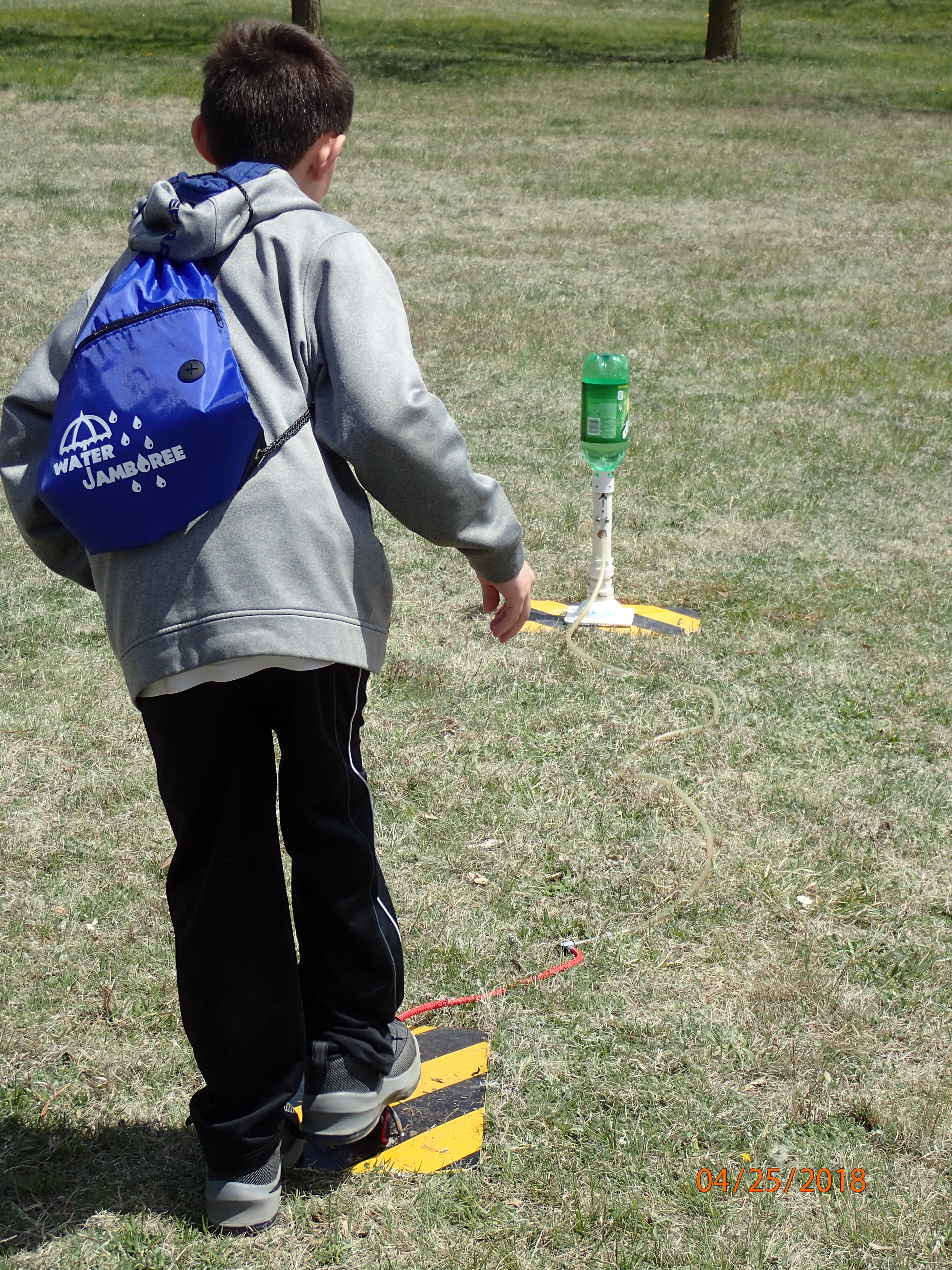 Student shooting off a water rocket