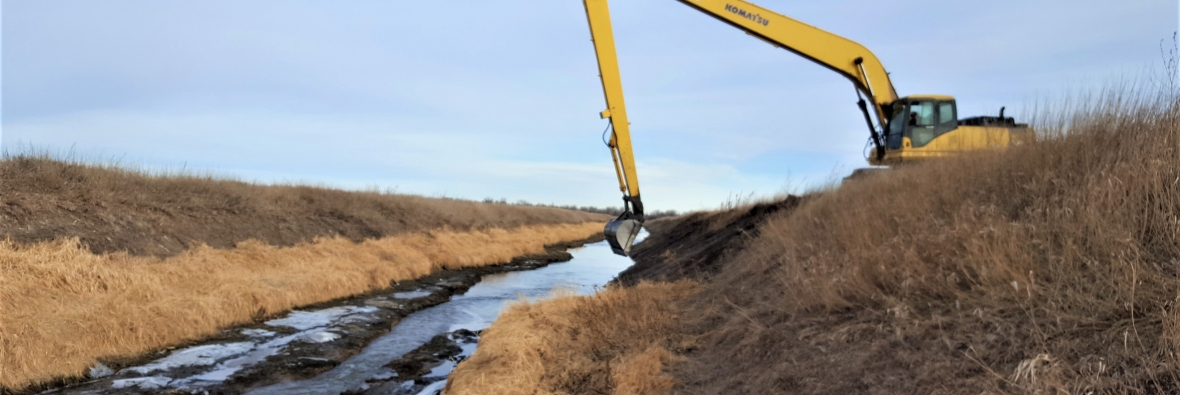 North Dry Creek Drainage District dredging excavator