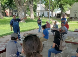 Pioneer Village - Alan Farlin speaking to group