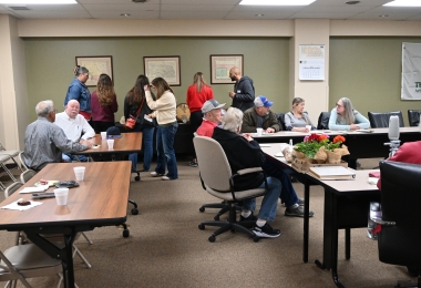 Attendees participating in PLT Tree Cookie Activity